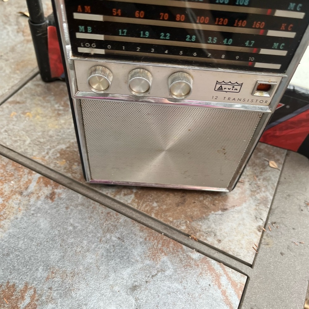 Avia Silver Transistor Radio with AM/FM Tuning